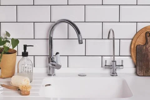 Modern minimal style kitchen with zero waste food and dishes cleaning items. Stock Photos
