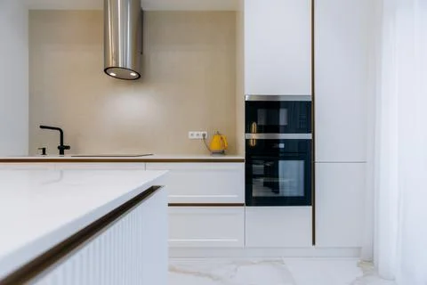 A Modern Minimalist Kitchen featuring Elegant and Sophisticated Design Stock Photos