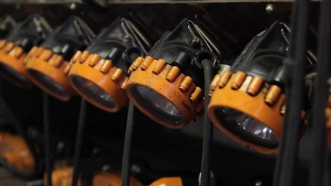 Modern mining lamp charging Stockbeeldmateriaal 74490576