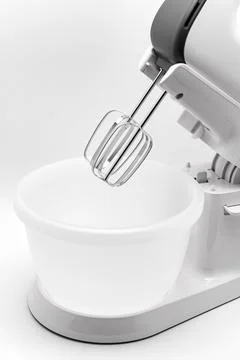 Modern mixer ready for baking at kitchen counter Stock Photos