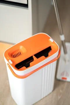 Modern mop with bucket with two sections. Mop with spin and rinse Stock Photos