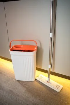 Modern mop with bucket with two sections. Mop with spin and rinse 스톡 사진