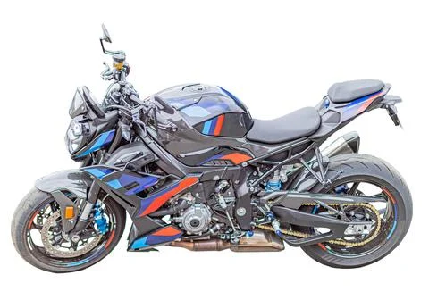 Modern motorcycle on white background, featuring sharp lines, sporty design.. Stock Photos