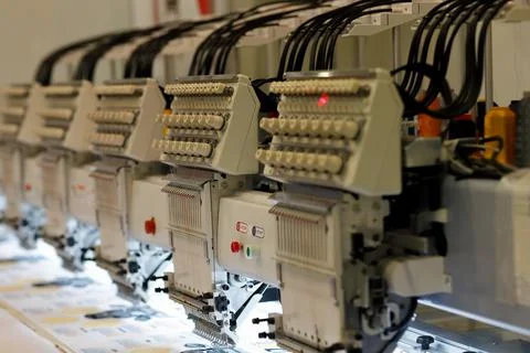 Modern multi head embroidery machine close up Stock Photos