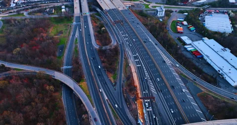 Modern multi-lane parallel roads with numerous moving cars. Commuting in the 스톡 동영상 334932823