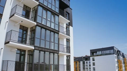 Modern multi-storey building. Large glazed balconies Video stock 156623821
