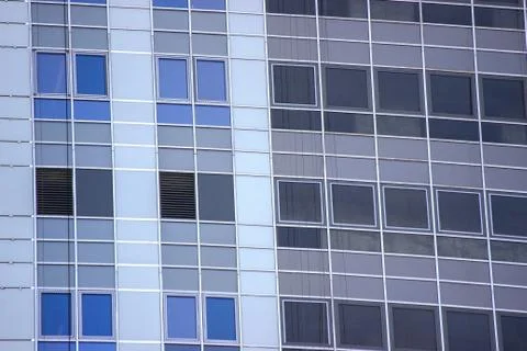 Modern multi-storey building, skyscraper. construction of a glass house. a la Stock Photos