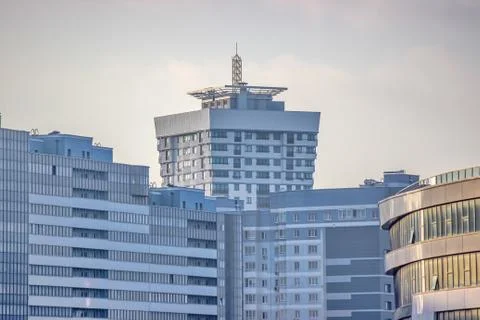 Modern multi-storey building, skyscraper. construction of a glass house. a la Stock Photos