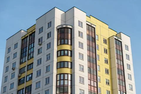 Modern multi-storey house in a new residential complex. The concept of mortga Stock Photos