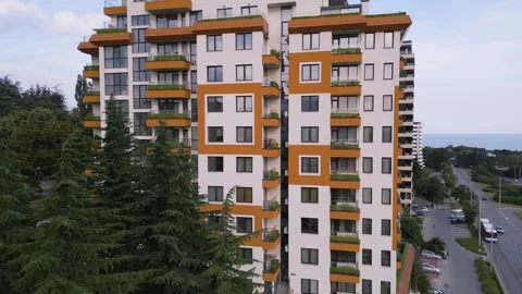 Modern Multi Story Apartment Building Facade Near Green Trees Aerial View Stock Footage 345158464