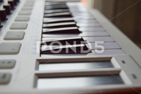 Modern Music MIDI Keyboard ~ Premium Stock Photo #40011684