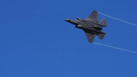 Modern NATO Stealth Fighter Performs High-G Snider Turn with Afterburner On Stock Footage 295870565