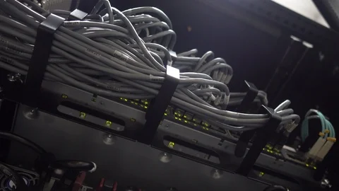Modern network switch with cables. Flashing server lamp, switch, router. 動画素材 114683207