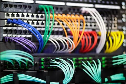 Modern networking equipment in server racks Stock Photos