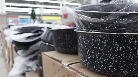 Modern nonstick pans in store Stock Footage 256823294