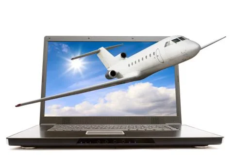 Modern notebook computer with airliner flying out Stock Photos
