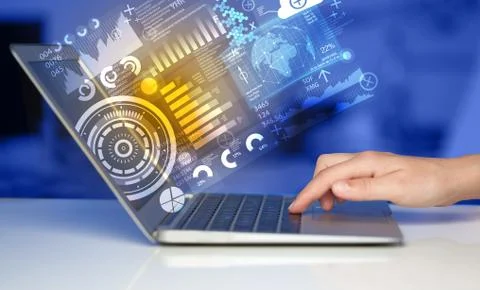 Modern notebook computer with future technology symbols 스톡 사진