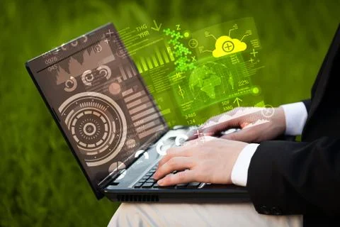 Modern notebook computer with future technology symbols 스톡 사진