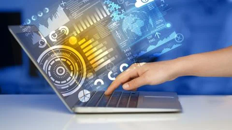 Modern notebook computer with future technology symbols 스톡 사진