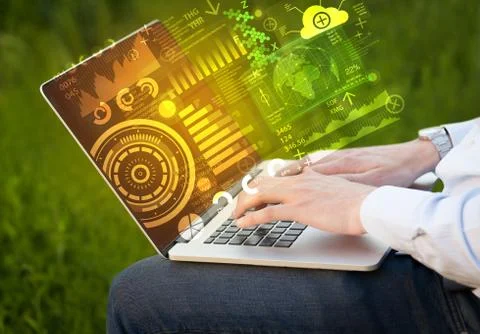 Modern notebook computer with future technology symbols 스톡 사진