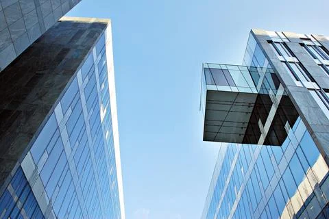 Modern office building against blue sky. Stock Photos