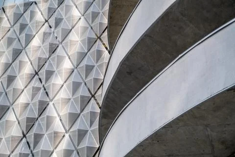 Modern office building with angular / rhombus structure of cells. Reworked Stock Photos