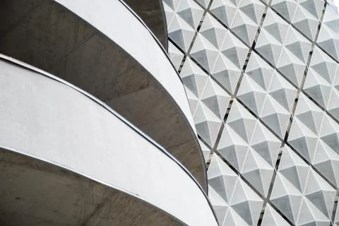 Modern office building with angular / rhombus structure of cells. Reworked Stock Photos