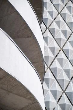 Modern office building with angular / rhombus structure of cells. Reworked Stock Photos