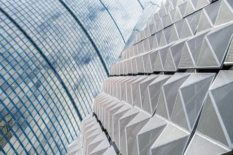 Modern office building with angular / rhombus structure of cells. Reworked Stock Photos