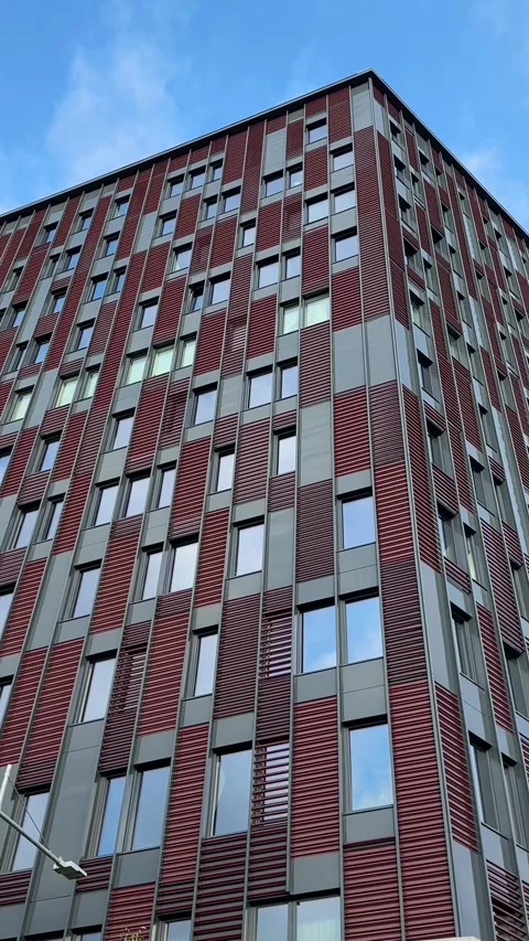 Modern Office Building Facade Against Blue Sky Video stock 343321054