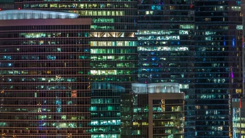 Modern office building with glowing windows at night timelapse. Moscow city Vídeos de archivo 81503151