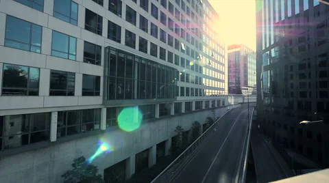 Modern office building. sun beaming. sunbeam. sun flare. urban city district Stock Footage 40654583