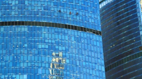  Modern office building. Window washers on skyscraper. 스톡 동영상 53839949