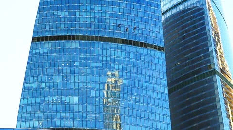  Modern office building. Window washers on skyscraper. Video stock 53839969