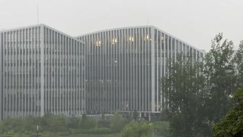 Modern Office Buildings Seen Through Heavy Summer Rain Stock Footage 340512519