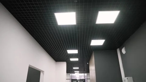Modern office ceiling with grid and square led lights Stock Footage 305866110
