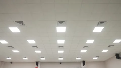 Modern Office Ceiling with LED Panel Lights and HVAC Vents Video stock 318579948
