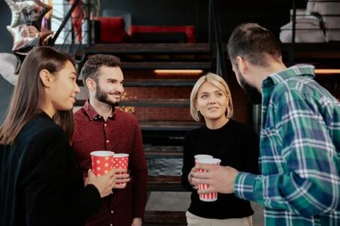 In a modern office center group of multiethnic workers while have a coffee break Stock Photos
