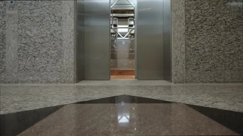 Modern office elevator door opening and closing Stock Footage 337946893