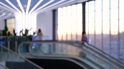 Modern office interior with escalator and natural lighting creates a bright Stock Footage 278100503