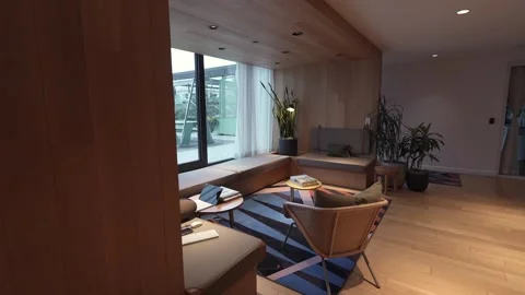 A Modern Office Interior Featuring Lush Plants and a Relaxing, Inviting 스톡 동영상 295075388