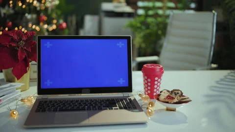 Modern office with table, laptop blank screen and cookies Video stock 253295097