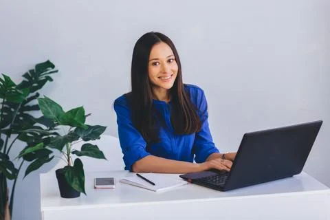 Modern office worker while working Fotos Stock