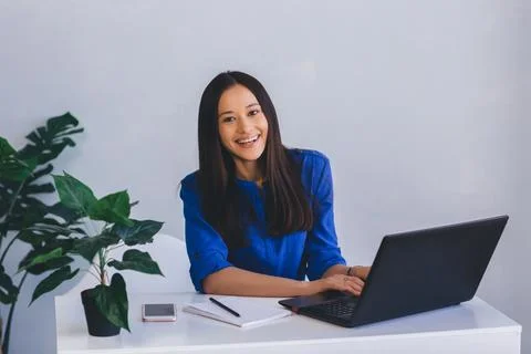 Modern office worker while working Fotos Stock