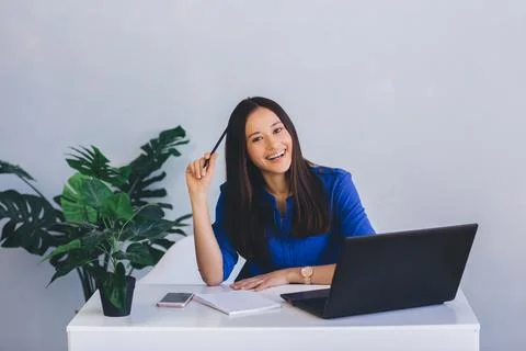 Modern office worker while working Photos
