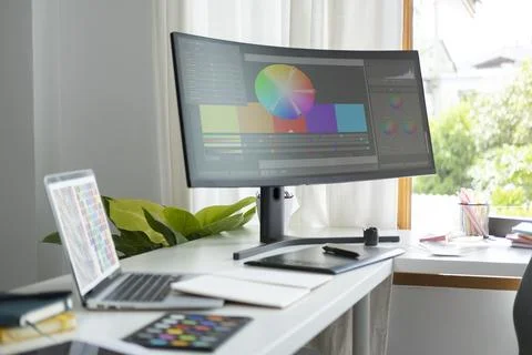 Modern office workplace with computers, graphic tablet and supplies  on whi.. Stock Photos