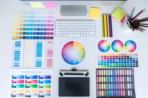 Modern office workplace with tablet, Graphic designer and color swatch samp.. Stock Photos