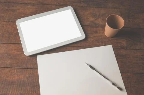 Modern office workplace with tablet pc on the table. On the table there is a  Stock Photos