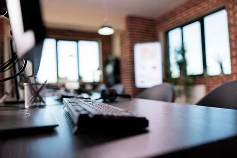 Modern office workspace with computer setup Stock Photos