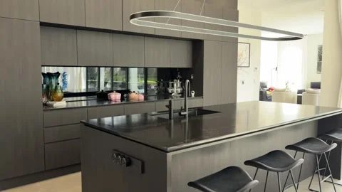 Modern Open-Plan Kitchen Reveal With Large Island and Bar Seating Stock Footage 343633818
